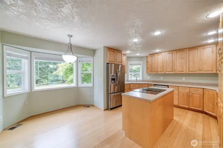 Kitchen with island and eating nook Kitchen with island and eating nook