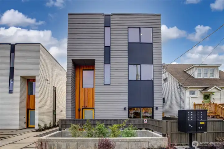 Modern curb appeal in a quiet yet vibrant in-city location. Modern curb appeal in a quiet yet vibrant in-city location.