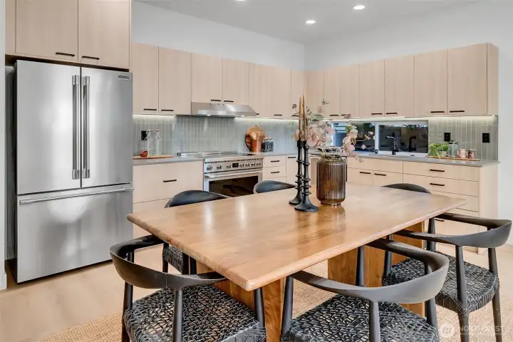 Open concept living, dining and kitchen on the main floor- plenty of room for hosting dinner parties! Open concept living, dining and kitchen on the main floor- plenty of room for hosting dinner parties!