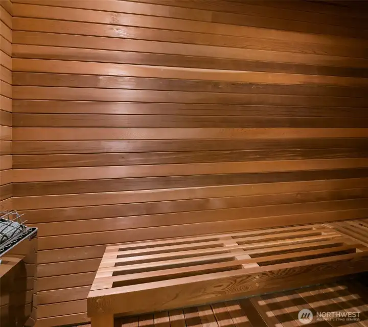 A true cedar sauna — the finishing touch on the primary suite's spa side.