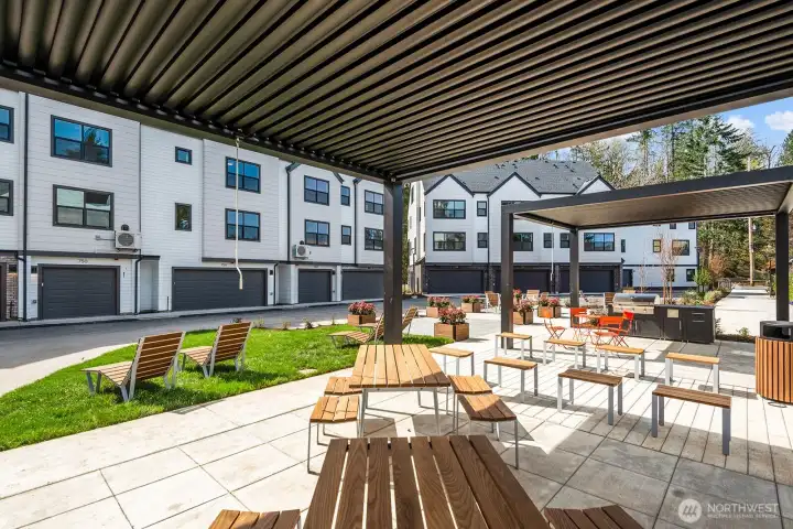Outdoor community area! Featuring picnic tables, benches, loungers, fire bits, BBQ and, ping pong table. Outdoor community area! Featuring picnic tables, benches, loungers, fire bits, BBQ and, ping pong table.