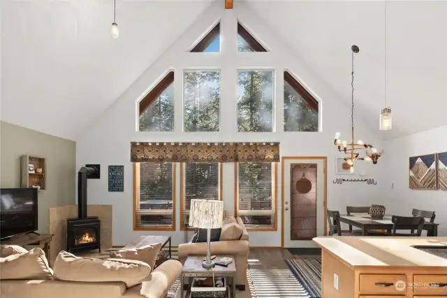Wall of windows and vaulted ceilings make the great room light and bright.