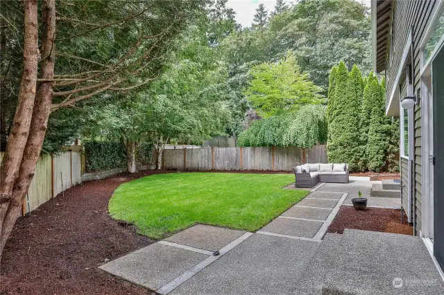 Level landscaped Back Yard and Patio is easy to maintain, ideal for gardening!