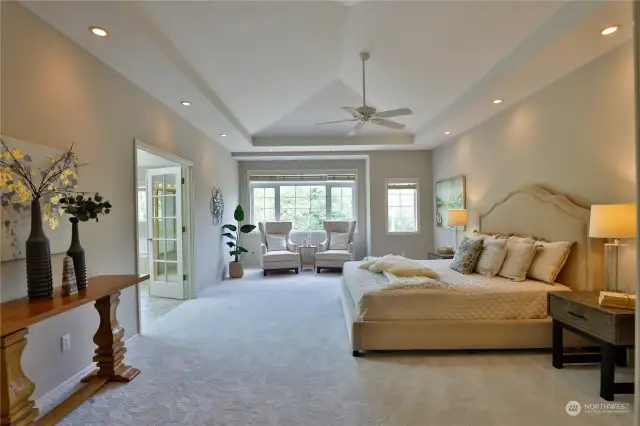Spacious Master BR has cathedral ceiling with ceiling fan, large windows, ensuite BA (via French doors)!