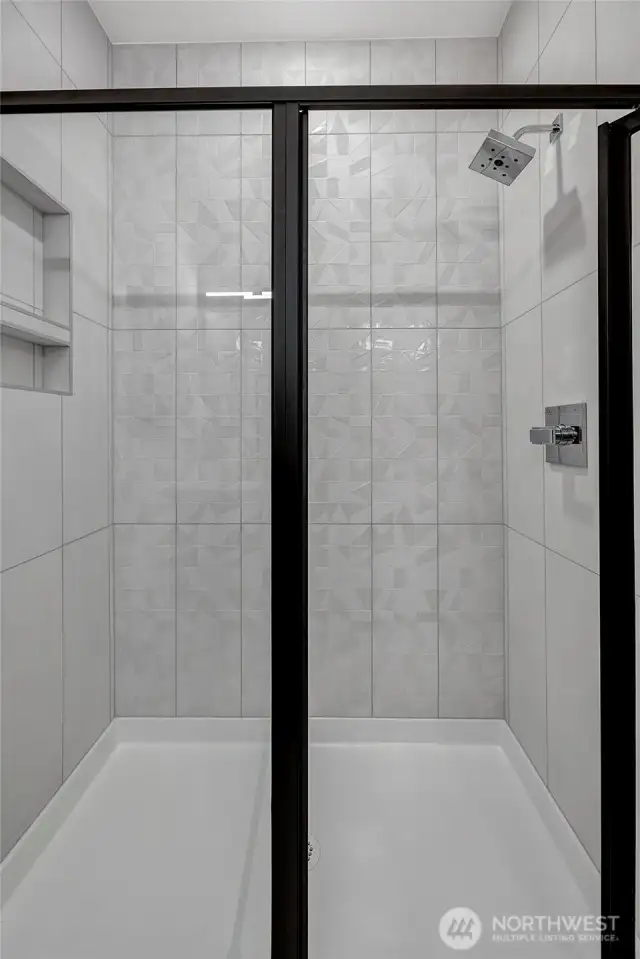 Full tile shower in primary bath (photos of lot34, same floorplan)