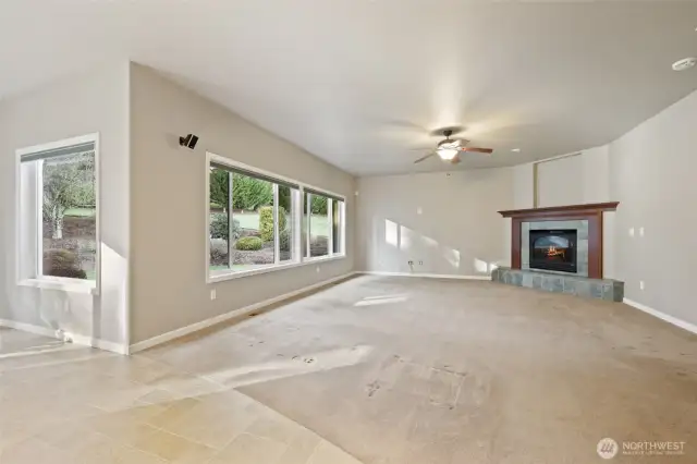 TV room off the kitchen with gas fireplace