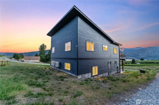 Exterior twilight view 1 of home.