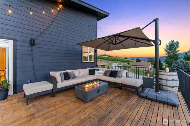 Exterior twilight view 2 of upper level deck.