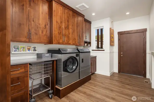 Large Laundry with passthrough to Walk-in Primary closet, Speed Queen Commercial Washer/Dryer ~ access to oversized  2 car garage