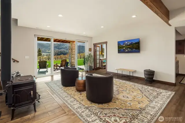 Lower level living, Wood burning fireplace, slider to lower level patio.
