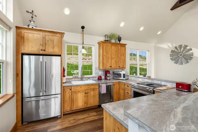 Open Floor plan, large kitchen with Kitchen Aide Appliances