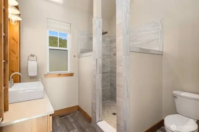 3/4 bath with tile shower