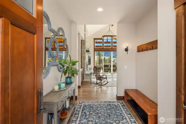 Built by Mulhall Construction, enter through an oversized  Knotty Alder custom door