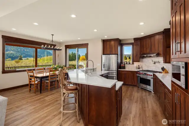 Open concept with large  kitchen & custom cabinetry.