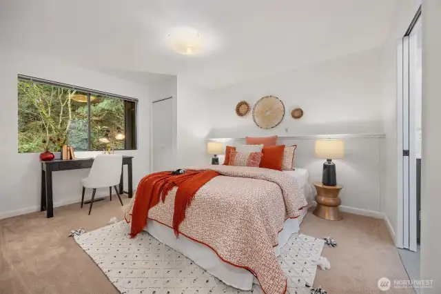 Bedroom three on the same floor is a serene and inviting en-suite, perfect for relaxation.