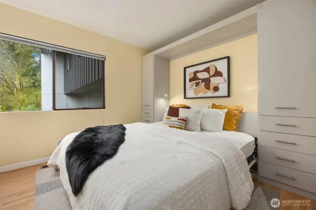On the lower floor, find a comfortable and private guest bedroom with ample space for a King size Murphy bed.