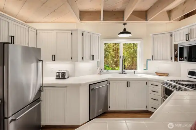 Light and bright kitchen with open beams and lots of storage