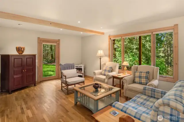Downstairs family room with walkout to acreage