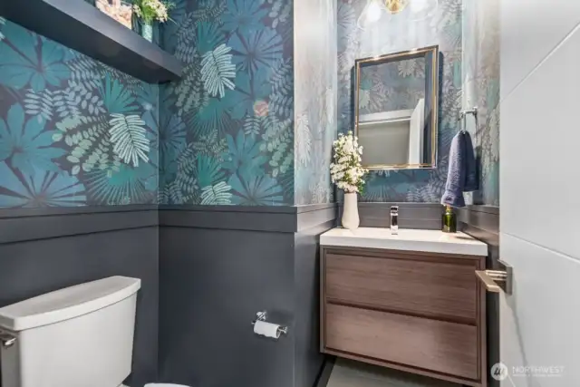 floating vanity, upgraded lighting, mirror and faucet