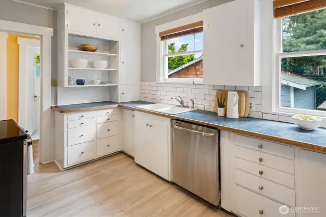 Bright kitchen looks out onto the back yard.