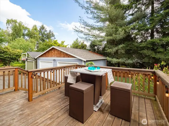 Another look at the back deck, garage and yard.