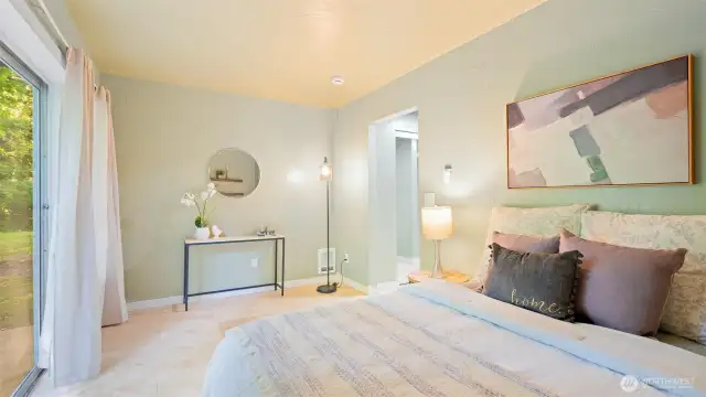 The lower-level primary bedroom offers plenty of space for your furniture - even a large armoire fits with ease. Now let’s head outside and check out the awesome backyard!