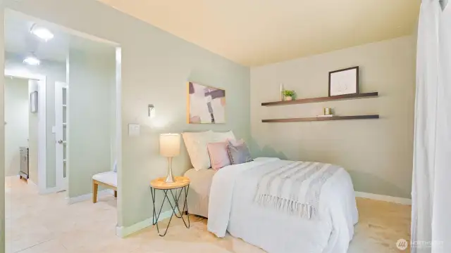 The cozy nook with the bench could easily become extra closet space if you need it. Just one more way this home flexes to fit your life.