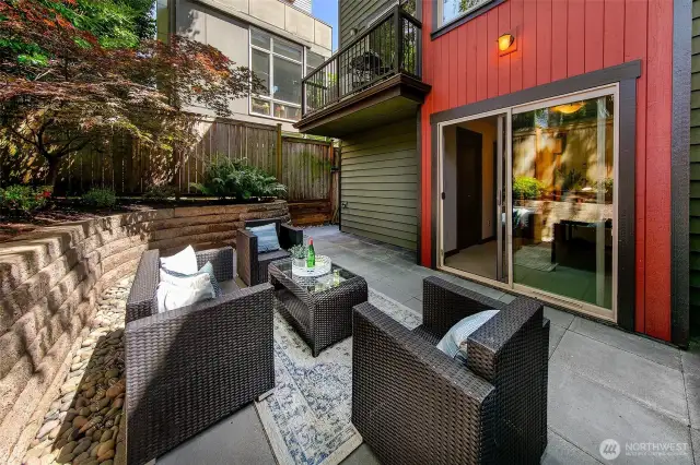 Low maintenance landscaping and a great place for a grill