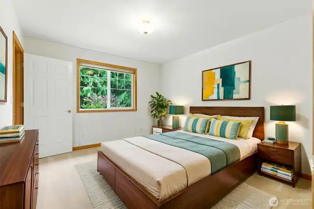 The second bedroom is finished in soft, neutral tones, providing the perfect canvas for your personal style and decorator touches.(Virtually staged)