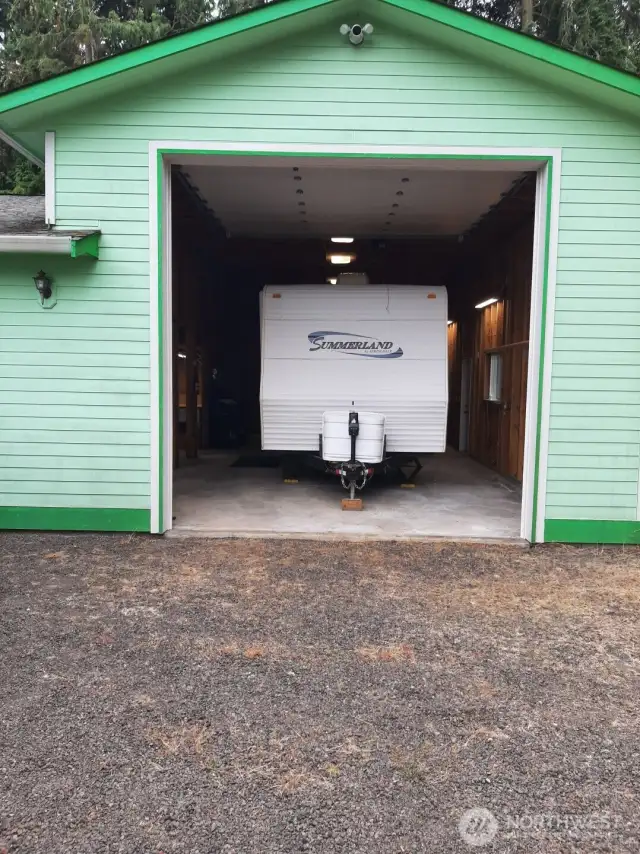 Well-appointed RV garage adds versatility and value to the property