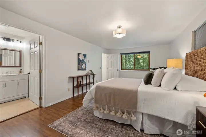 Primary suite with full bathroom and jetted tub