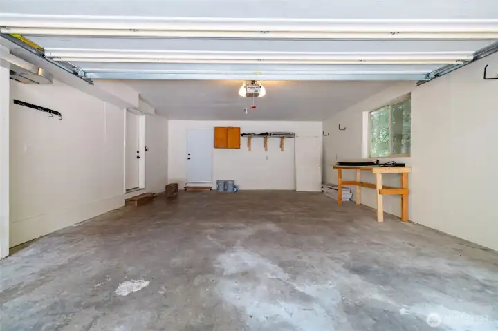 spacious 2 car garage with deck access