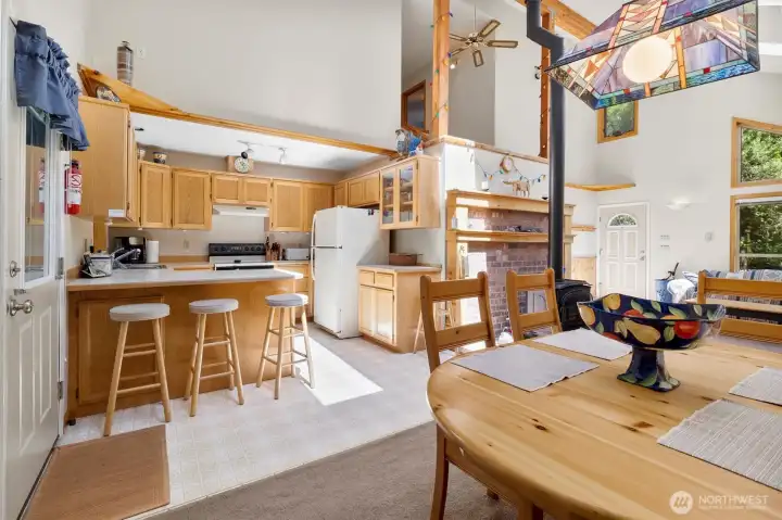 Open kitchen with breakfast bar and plenty of workspace.