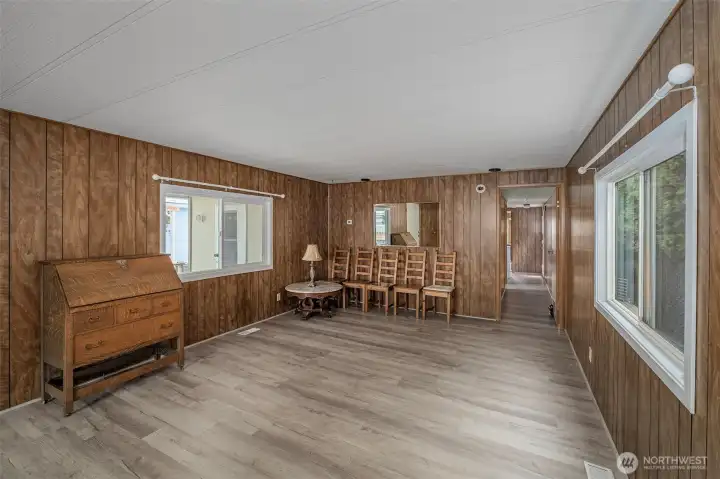 Living room area... desk, chairs and table in kitchen can stay