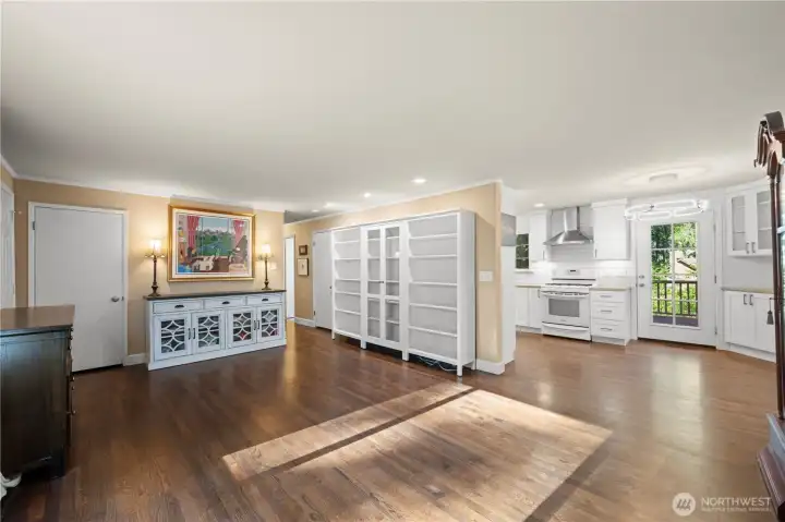 Spacious living room with refinished oak hardwoods, beautifully updated kitchen & dining area.