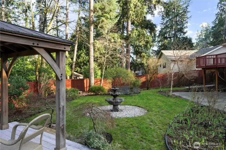 Beautiful, very private backyard with gazebo, oversized patio & established landscaping
