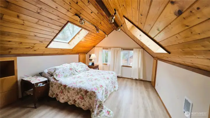 Second floor suite with skylights and ensuite bathroom and built-in    storage