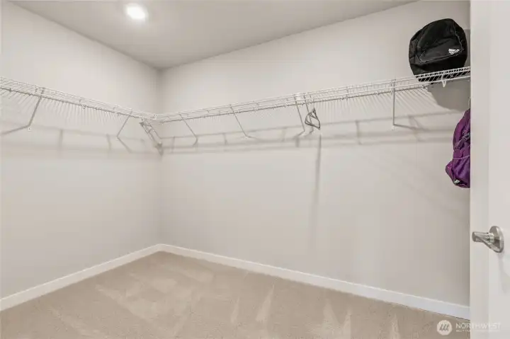 Spacious primary closet! Photos are for representational purposes only. Colors and finishes may vary.