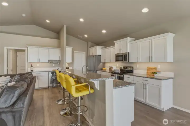 Split-level island with elevated breakfast bar