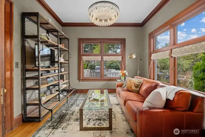The library located north of the kitchen and mudroom, directly off of the dining room.