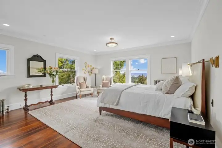 Located on the east side of the home ~ imagine waking to glorious pink sky sunrises across the lake and snow capped mountains.