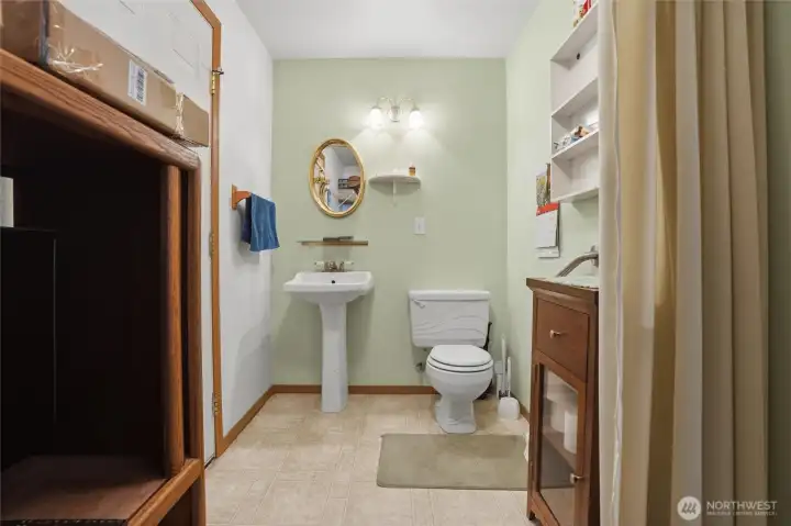 Convenient 1/2 bath between the garage and house.