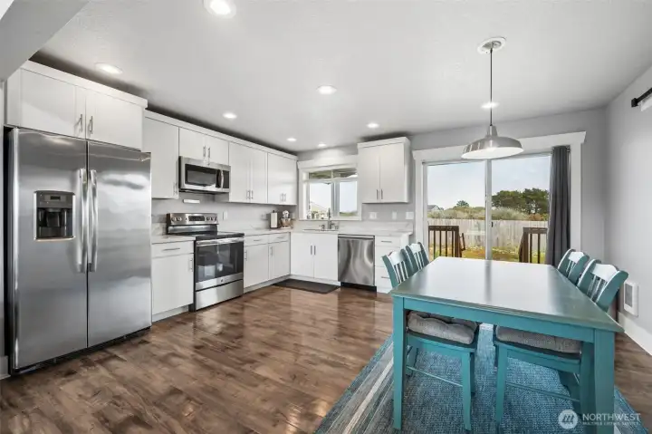 This kitchen is large enough for a dining table; this one may seat up to six comfortably.