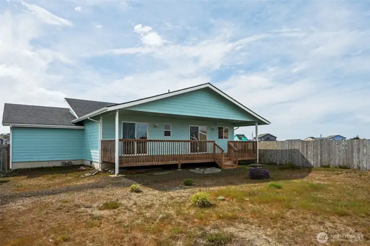 This view of the back side shows the fully-covered back porch.