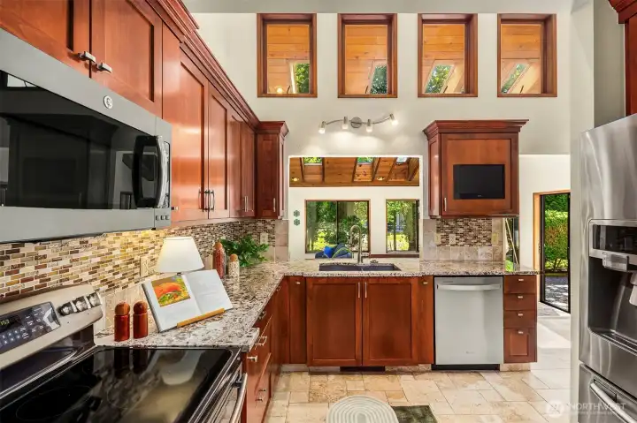 Upgraded appliances and yes that's a built in TV for whatever chef likes to watch while cooking!