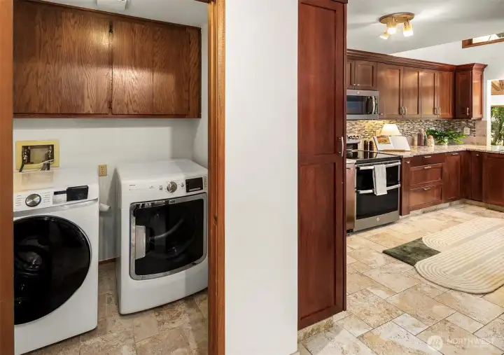 Fantastic laundry room is just off the kitchen and the upscale machines stay!