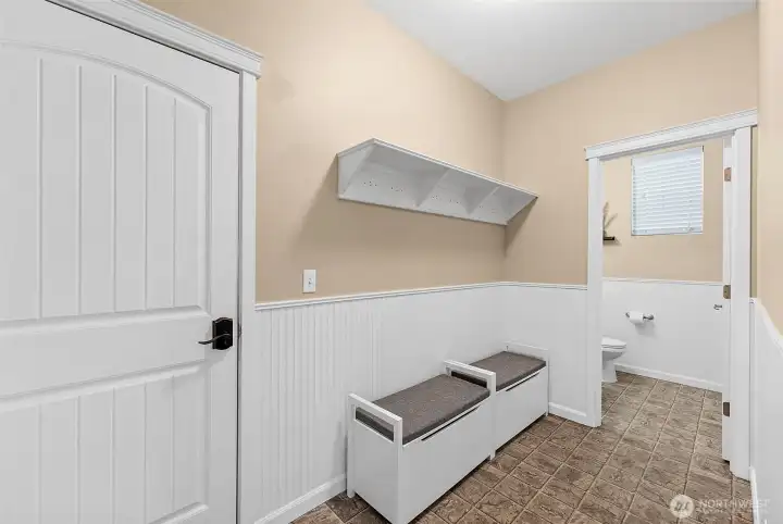 Entry off garage with 1/2 bath 10'x6'