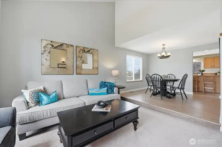 Living room flows to the formal dining area