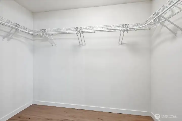 Walk-in closet in primary bedroom