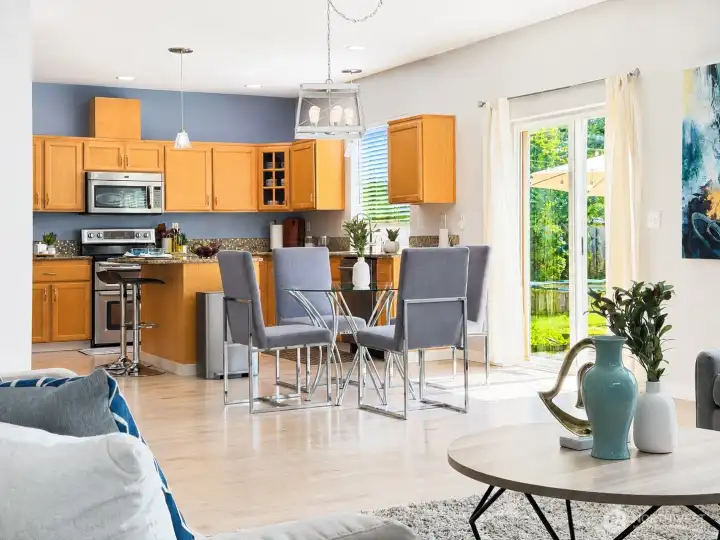 Living area looking into eat in kitchen